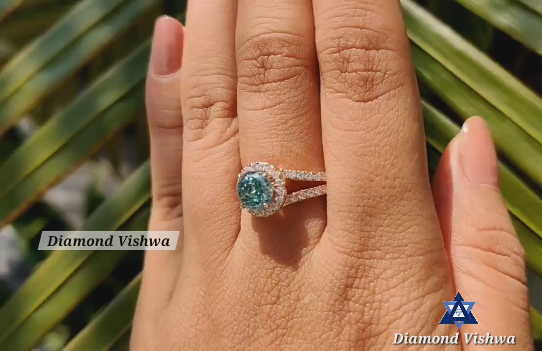 2ad3cb7ad7634ee989313f45ea730eed.thumbnail.0000000000 Cyan Blue Moissanite Halo Engagement Ring | Rose Gold Split Shank - 925 Silver - Image 1